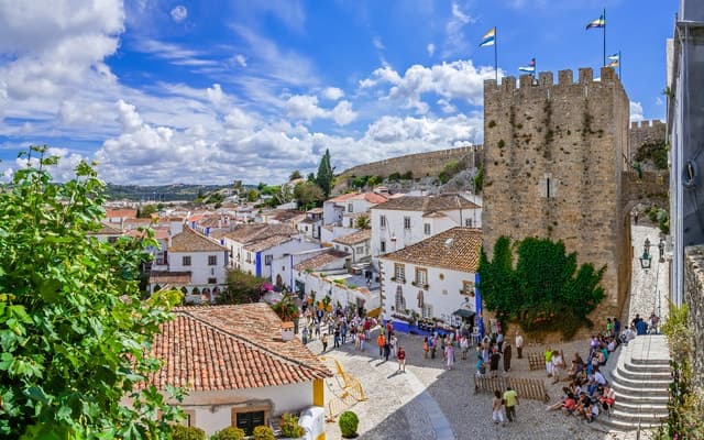 From Lisbon: Fatima, Nazare, and Obidos 8-People Group Tour