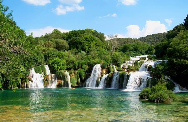 The cheapest Krka Waterfalls with Boat Ride,Guide & Swimming
