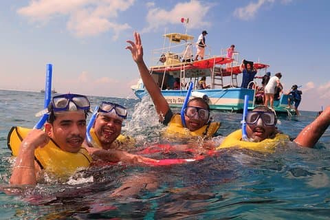 Cozumel Coral Reef Snorkeling by Glass Bottom Boat with Guide