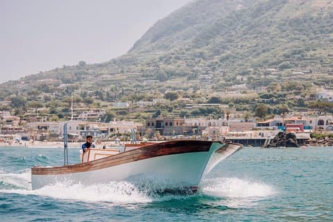 Boat tour of the island of Ischia with a typical Ischia 10-metre launch full day