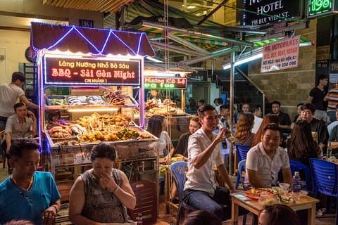 Saigon Night Bites on Foot: Local Vendors, Stories & Sweet Finish