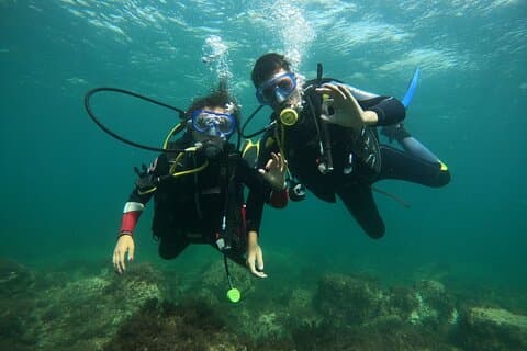"Baptism of the Sea: Diving on the Island of Elba"