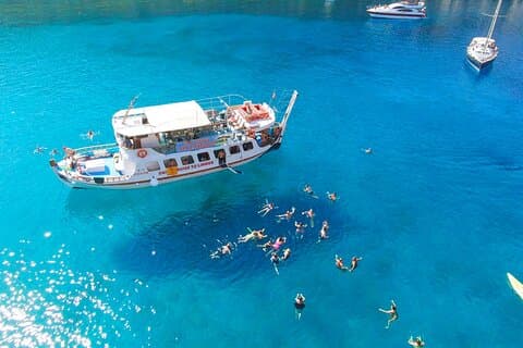 Faliraki: Lindos Boat Cruise with Swim stops & Free Time