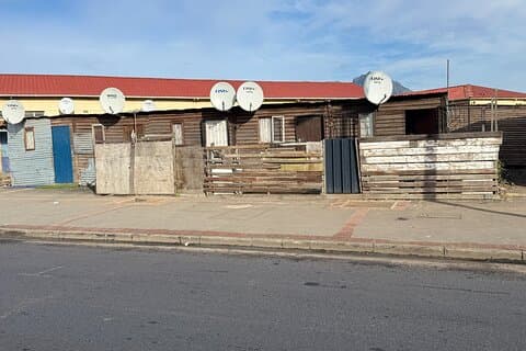 Langa Township and District Six Museum Tour with Transfers