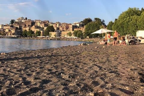 Discover Anguillara Village Lake Boat Tour and Sunset Swim
