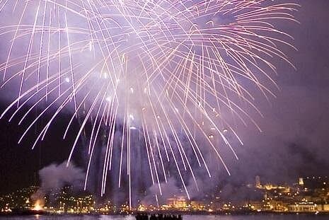 Cannes: fireworks & sunset catamaran cruise with dinner