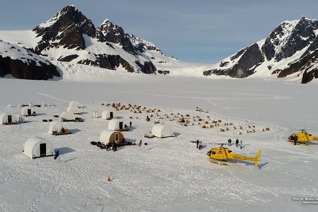 Helicopter to a Dogsledding Experience with a Glacier Landing