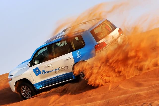 Abu Dhabi: Desert Safari with BBQ, Camel Ride & Sandboarding
