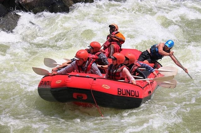 White Water Rafting & Swimming under the Falls