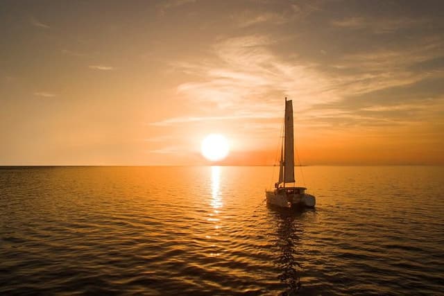 Santorini Luxury Catamaran Sunset Cruise with BBQ, Drink and Transfer