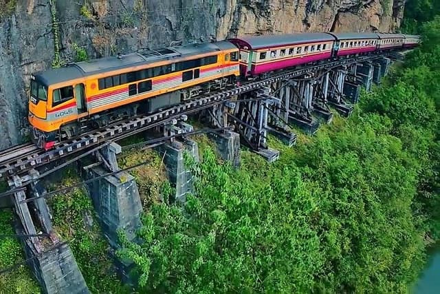 Train trip death railway Bridge on river Kwai from Bangkok to Kanchanaburi trip