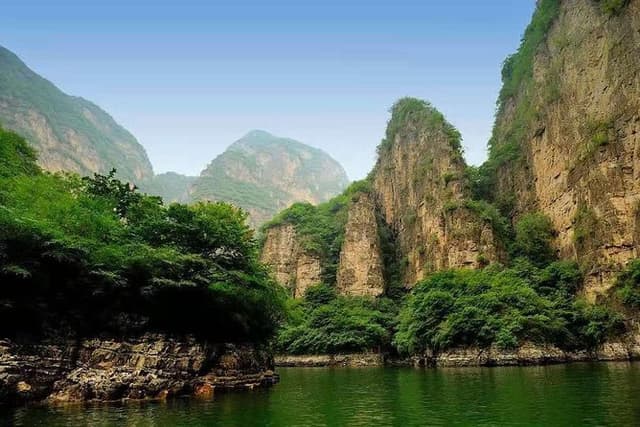 Private Transfer to Longqing Gorge and Guyaju Caves Excursion by English Driver