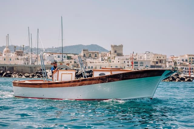 Boat tour of the island of Ischia with a typical Ischia 10-metre launch full day