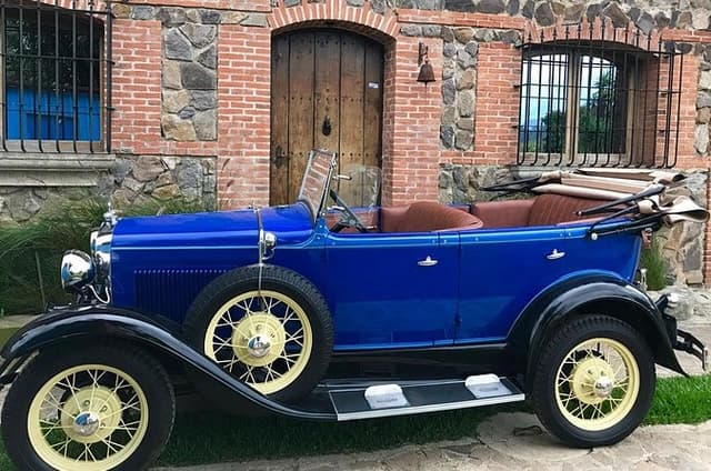 Antigua in a classic car