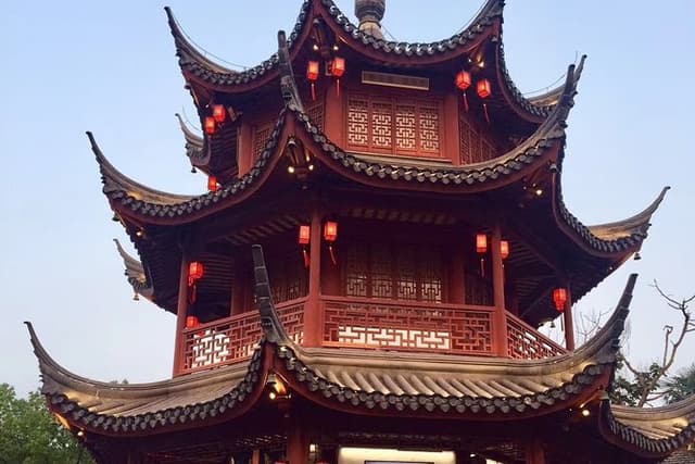 Private Tour of Shanghai Zoo, Xintiandi and Qibao Old Street with Local Delicacy