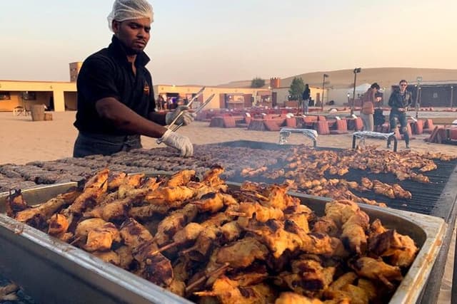 Dubai Dunes Safari With Quad Bike, Camel Ride, BBQ Dinner & Live Shows
