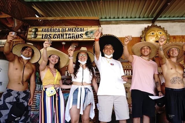 Guided tour of an ancestral Mezcal distillery with transport