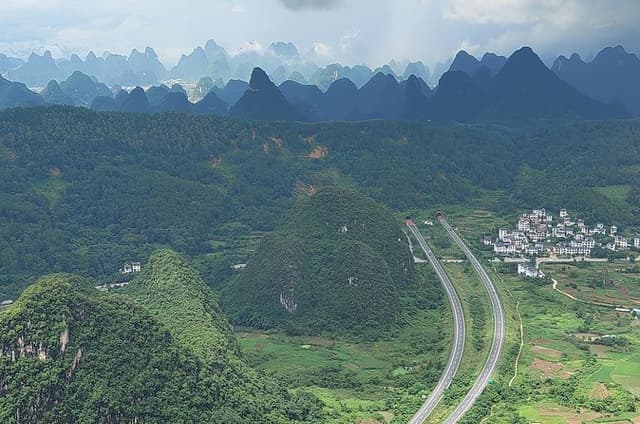 1-Day Yangshuo Yulong Bamboo Boat and Ruyi Peak Cable Car from Xingping Hotel