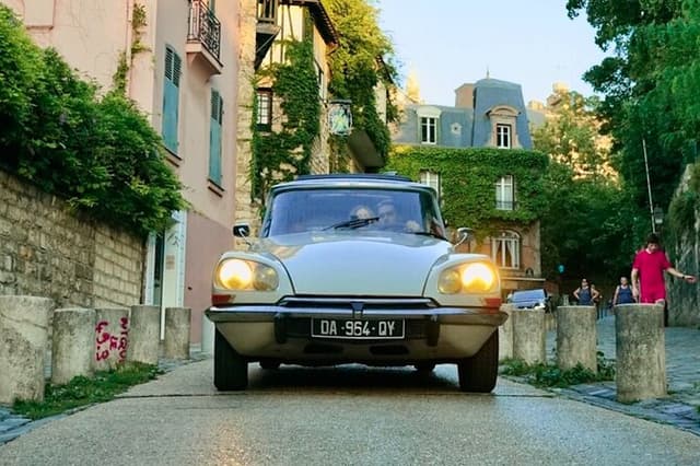 The Essentials of Paris in a Classic Open Top Car Citroën DS