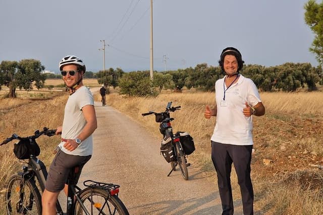 E-bike tour in Ostuni. Oil mill, Dolmen and huge olive trees