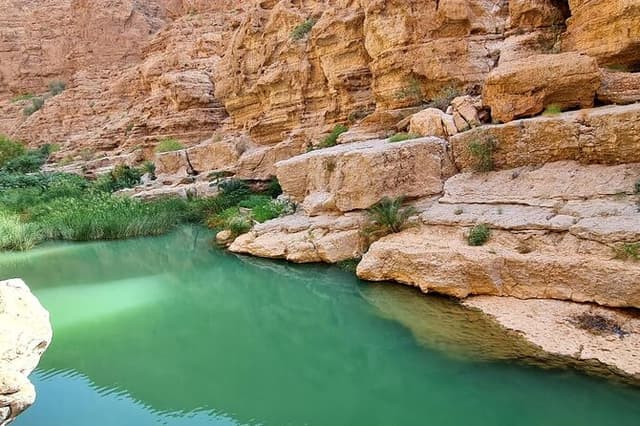 Full Day Group Tour to Wadi Shab Bimmah Sinkhole and Fins Beach