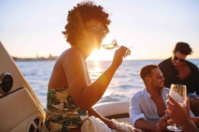 Day to Night Capri Boat Tour with Swim, Snorkel & Aperitif