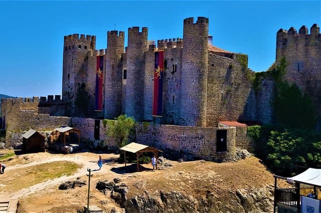 Tranquility to Thrills: Obidos,Alcobaca and Nazare Private Tour