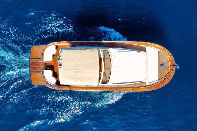 Luxury private boat tour to Capri and Blue Grotto on Gozzo 32 ft