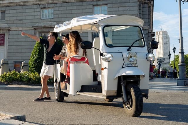 "Madrid: Panoramic views in Tuk Tuk with pickup available"