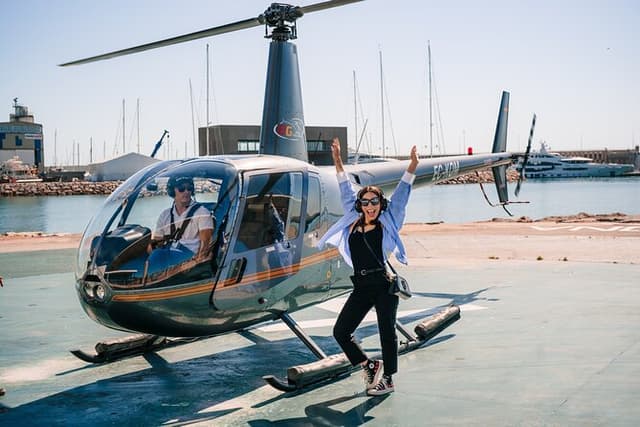 Barcelona Helicopter, Sailboat & Old Town Private Walking Tour