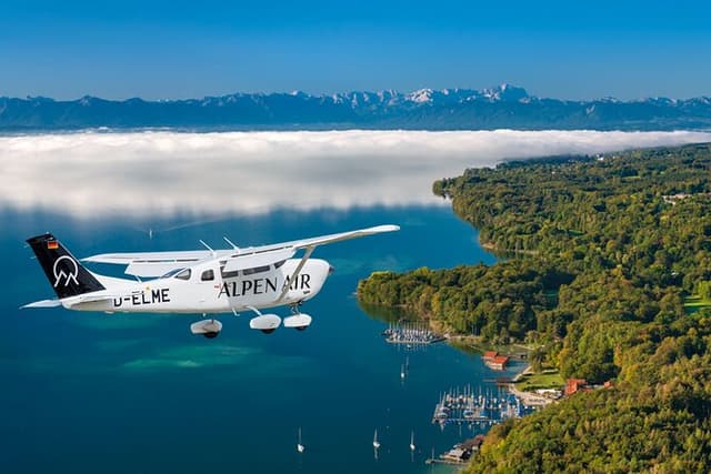 Sightseeing flight Zugspitze Neuschwanstein Castle Alps Munich Augsburg