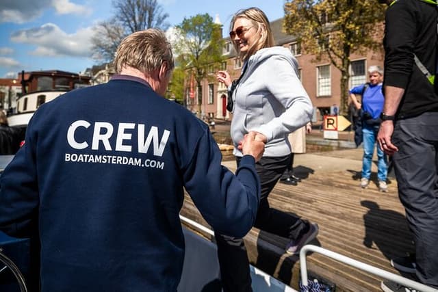 Amsterdam Open Boat Cruise with Live Guide and Two Drinks