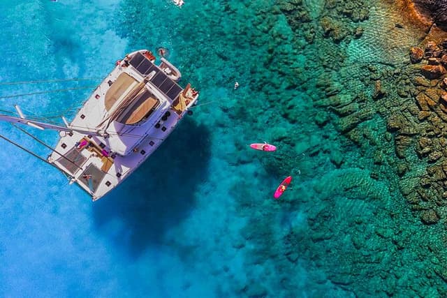 Catamaran Cruise to Dia Island with Meal and Water Activities