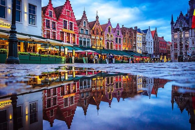 Across Bruges History Equals Fun with chocolate and waffle sample