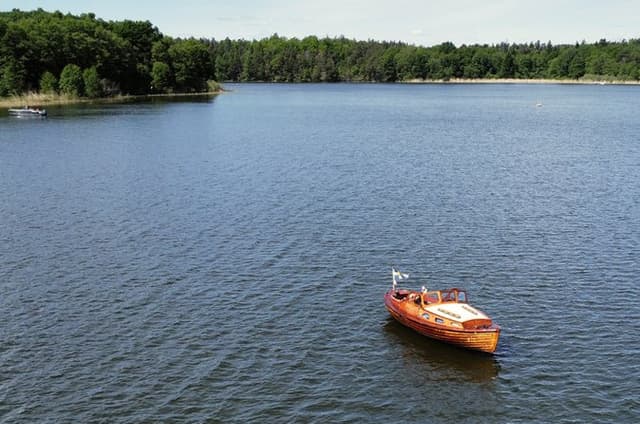 Nature Escape by Classic Wooden Boat