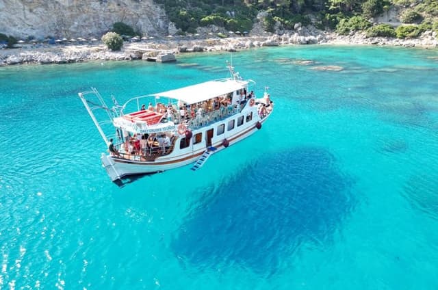 Faliraki: Lindos Boat Cruise with Swim stops & Free Time