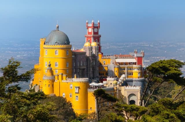 Lisbon: Sintra, Pena Palace, Regaleira & Cascais Small Group Tour