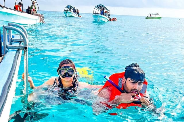 Snorkeling at Mnemba Island with Swimming and Sunset Dhow 