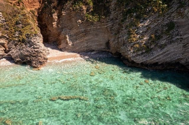 Budva Boat Tour with Swimming Hidden Beaches and Coastal Views