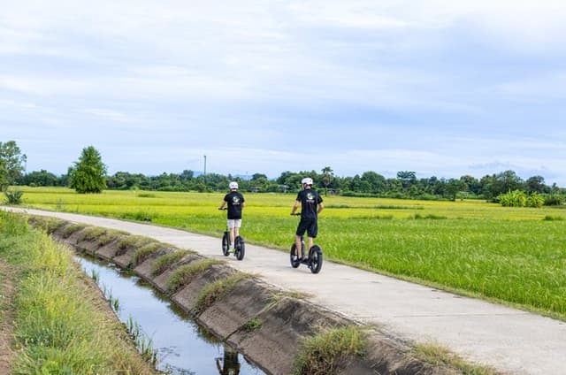 E-Scooter: old Town and rice fields