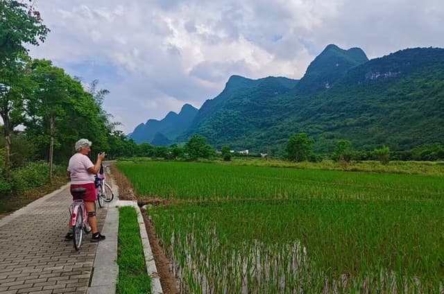 Yangshuo Gems Li River Boat Xianggong Hill and Yulong Biking