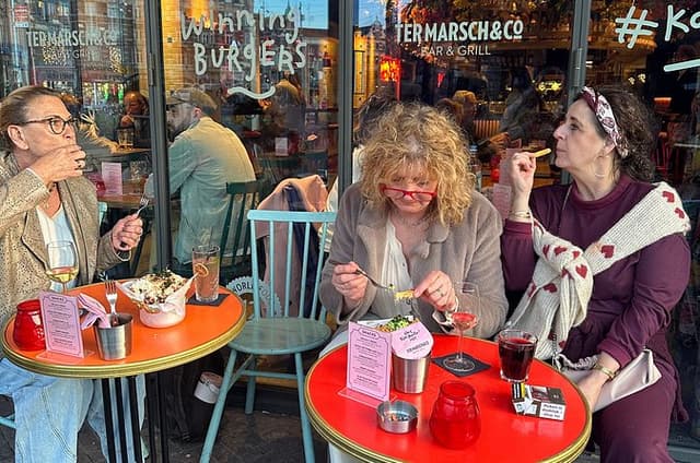 Amsterdam Walking Food Tour with 6 Tastings and Drink