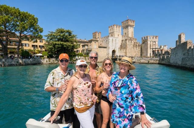 Sunset boat cruise with wine and food tasting from Garda