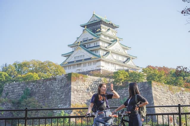Osaka Castle & Local Neighborhoods 5h Bike Tour with Lunch