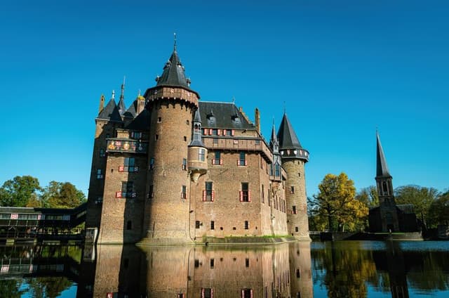 Utrecht Private Tour DeHaar Castle and Boat Cruise with Guide