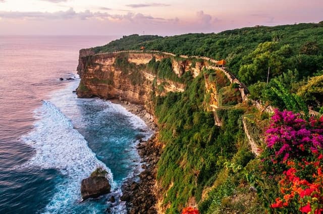 South Bali Tour Parasailing Uluwatu Temple and Seafood Dinner