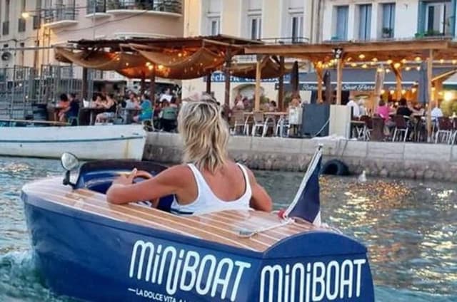 Set in miniboat at sunset
