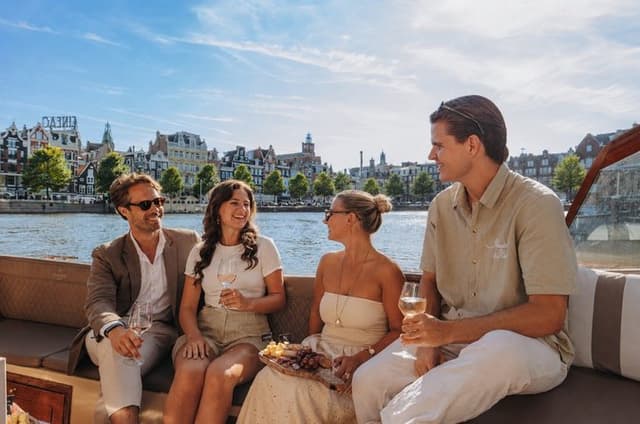 Amsterdam 1H Premium Canal Cruise with Snacks and Optional Drinks