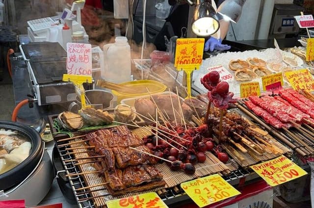 Kuromon Market Food Walking Tour in Osaka (6 stops, 6 tastes)