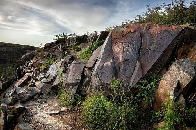 Discover Tanbaly Petroglyphs